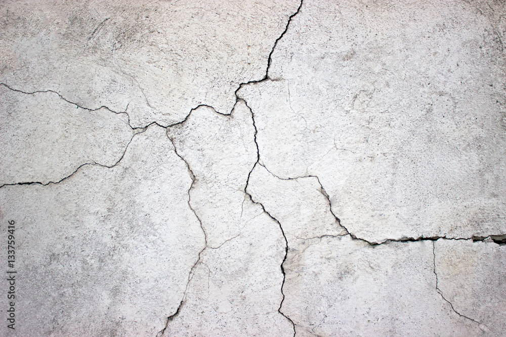 Wall mural cracked concrete wall covered with gray cement texture as backgr