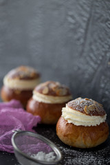 Fresh baked homemade buns on the table for breakfast Baking traditional Swedish semla bread