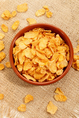 corn flakes in a brown bowl
