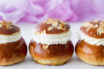 Fresh baked homemade buns on the table for breakfast Baking traditional Swedish semla bread