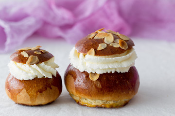 Fresh baked homemade buns on the table for breakfast Baking traditional Swedish semla bread