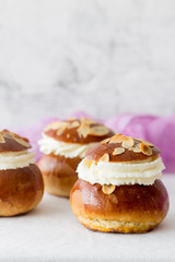 Fresh baked homemade buns on the table for breakfast Baking traditional Swedish semla bread