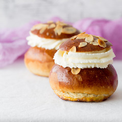 Fresh baked homemade buns on the table for breakfast Baking traditional Swedish semla bread