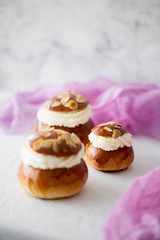 Fresh baked homemade buns on the table for breakfast Baking traditional Swedish semla bread
