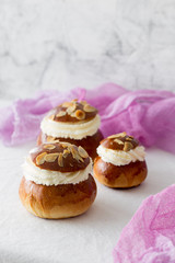 Semla traditional swedish homemade sweet roll bun baked in various forms in the Nordic countries on Shrove Monday and Shrove Tuesday