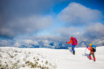 Climbers are on snow.