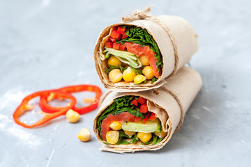 Healthy wraps with salmon and chickpeas for lunch. Love for a healthy food concept