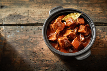 Whole pot of goulash in an aerial view - obrazy, fototapety, plakaty