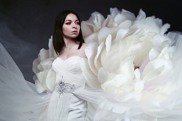 Beautiful sexy young woman. Portrait of girl in long white dress, mystical. Flower photo clipart