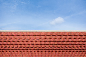 Home roof top in beautiful blue sky background.