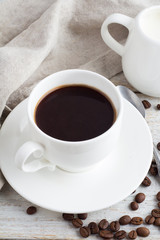 coffee in a cup on a wooden background