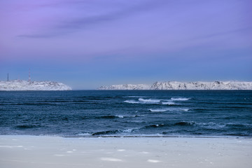 Snowy coast of Barents Sea in Teriberka, Murmansk Region, Russia