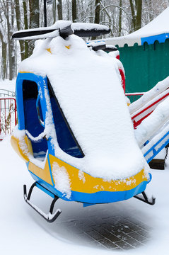 Snowy attraction Helicopters in winter park, Gomel, Belarus