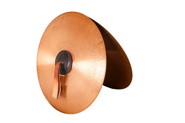 Fototapeta premium Close up of an prcussion cymbals with leather handle isolated on background.