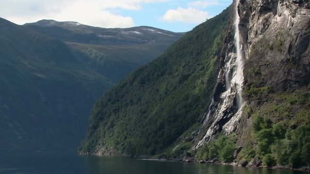 The seven sisters waterfall in Geirangerfjord filmed from a passing ship