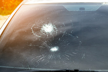 Crash windshield glass of car,the broken and damaged car