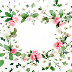Naklejka na ściany i meble Round frame made of pink and beige roses, green leaves, branches, floral pattern on white background. Flat lay, top view. Valentine's background