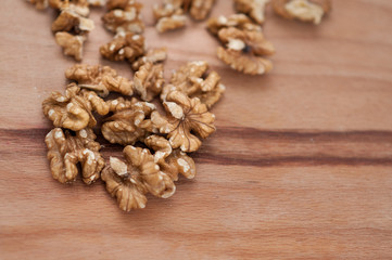 tongs for chopping walnuts and shelled walnut