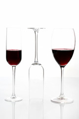 glasses with red wine on a light background