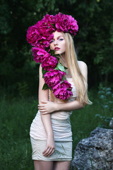 Fototapeta premium girl with flowers, beauty, girl with peonies, model with flowers, girl in a wreath of flowers, wreath of flowers