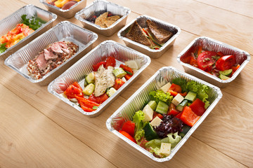 Healthy food in boxes, diet concept.