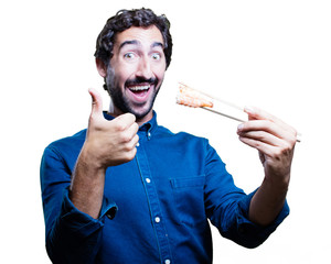 young man eating sushi. all right concept