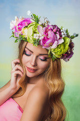 Obraz na płótnie Canvas Beautiful Ukrainian bride with large flower crown