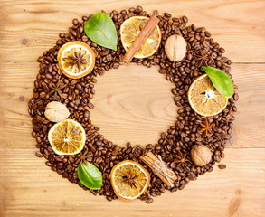 Coffee background. Heap roasted coffee beans in shape of wreath