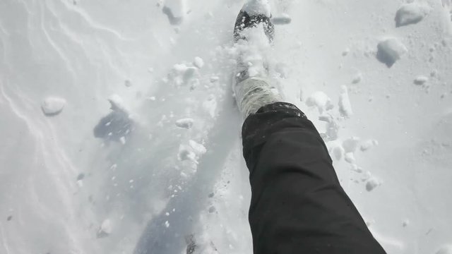 Walking through the snow on mountains