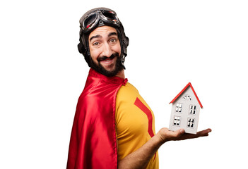 crazy super hero with a house - obrazy, fototapety, plakaty