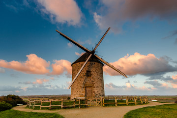 Fototapeta na wymiar Taditional ancient windmill in France.