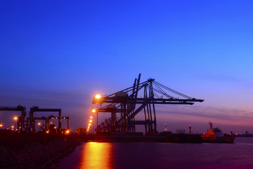 Fototapeta premium Working cranes, in the evening
