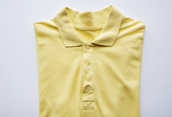 close up of polo t-shirt on white background