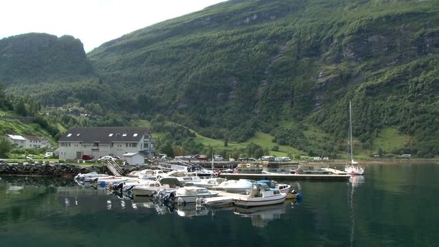 Small boats in the harbour of Geiranger, Norway