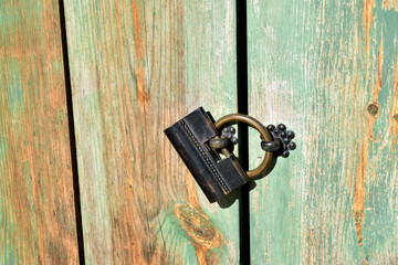 Ancient Asian Temple Ring Shaped Door Handle on Hardwood Doorfra