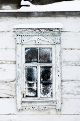 white wooden window with a pattern
