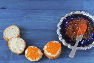 Red caviar toasts and caviar shell plate horizontal