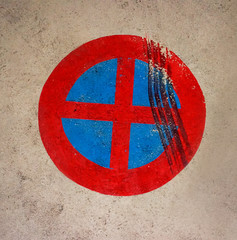 Dirty parking prohibited symbol on ground