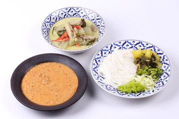 Rice noodle , green chicken curry and fish curry in coconut-milk