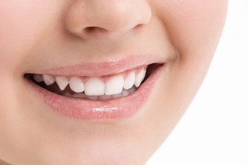 Naklejka premium Women smile. Face. White teeth. Photo closeup