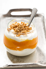 dessert with pumpkin, whipped cream and cookies, closeup