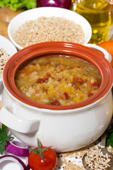 healthy lunch, soup with lentils and vegetables, vertical 