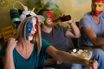 Woman and men cheering