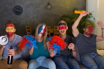 Happy sport fans cheering