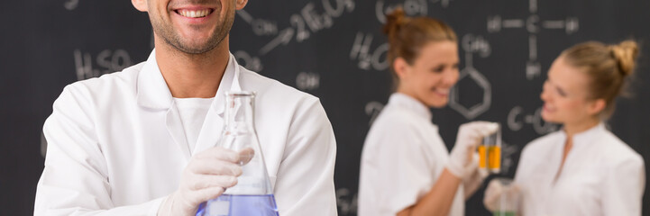 Students working with chemicals in classroom