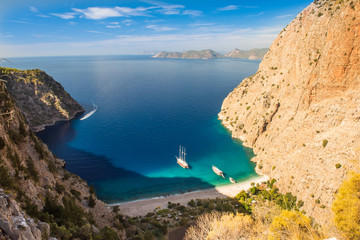 Fototapeta premium Butterfly valley sea view and boat Oludeniz,Turkey