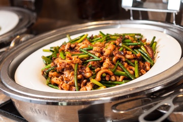Fried squid with garlic moss