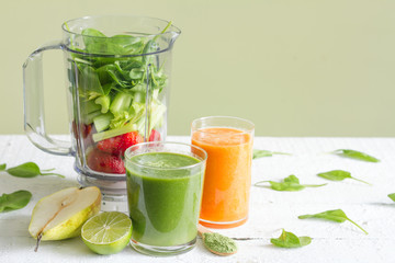 Green smoothie with blender and fruits health diet lifestyle concept
