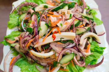 Seafood salad with squid and vegetables