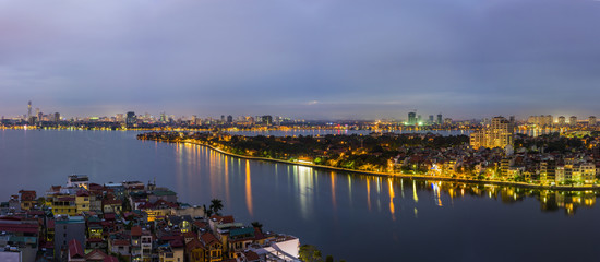 Aerial view of Hanoi skyline at West Lake ( Ho Tay in Vietnamese), at twilight